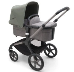 Bugaboo Fox 5 - Graphite/Grey Melange Base With Sun Canopy 39 Bugaboo Fox 5 - Graphite/Grey Melange Base With Sun Canopy -Baby Products Series LargeJPG 100167010 fox5 gra bassinet gm forest green sideshot