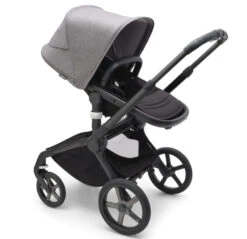 Bugaboo Fox 5 Travel System - Black/Midnight Black Base With Sun Canopy 32 Bugaboo Fox 5 Travel System - Black/Midnight Black Base With Sun Canopy -Baby Products Series LargeJPG 100167012 fox5 black seat black grey melange sideshot 0867fcd9 f167 41bf b501 09fe0cbd282d