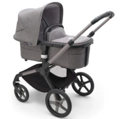 Bugaboo Fox 5 - Graphite/Grey Melange Base With Sun Canopy 31 Bugaboo Fox 5 - Graphite/Grey Melange Base With Sun Canopy -Baby Products Series LargeJPG 100167012 fox5 gra bassinet gm grey melange sideshot