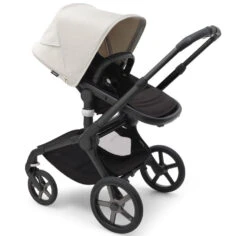 Bugaboo Fox 5 Travel System - Black/Midnight Black Base With Sun Canopy 39 Bugaboo Fox 5 Travel System - Black/Midnight Black Base With Sun Canopy -Baby Products Series LargeJPG 100167014 fox5 black seat black misty white sideshot c525838e 448a 4039 bf0f 87c543b5738e